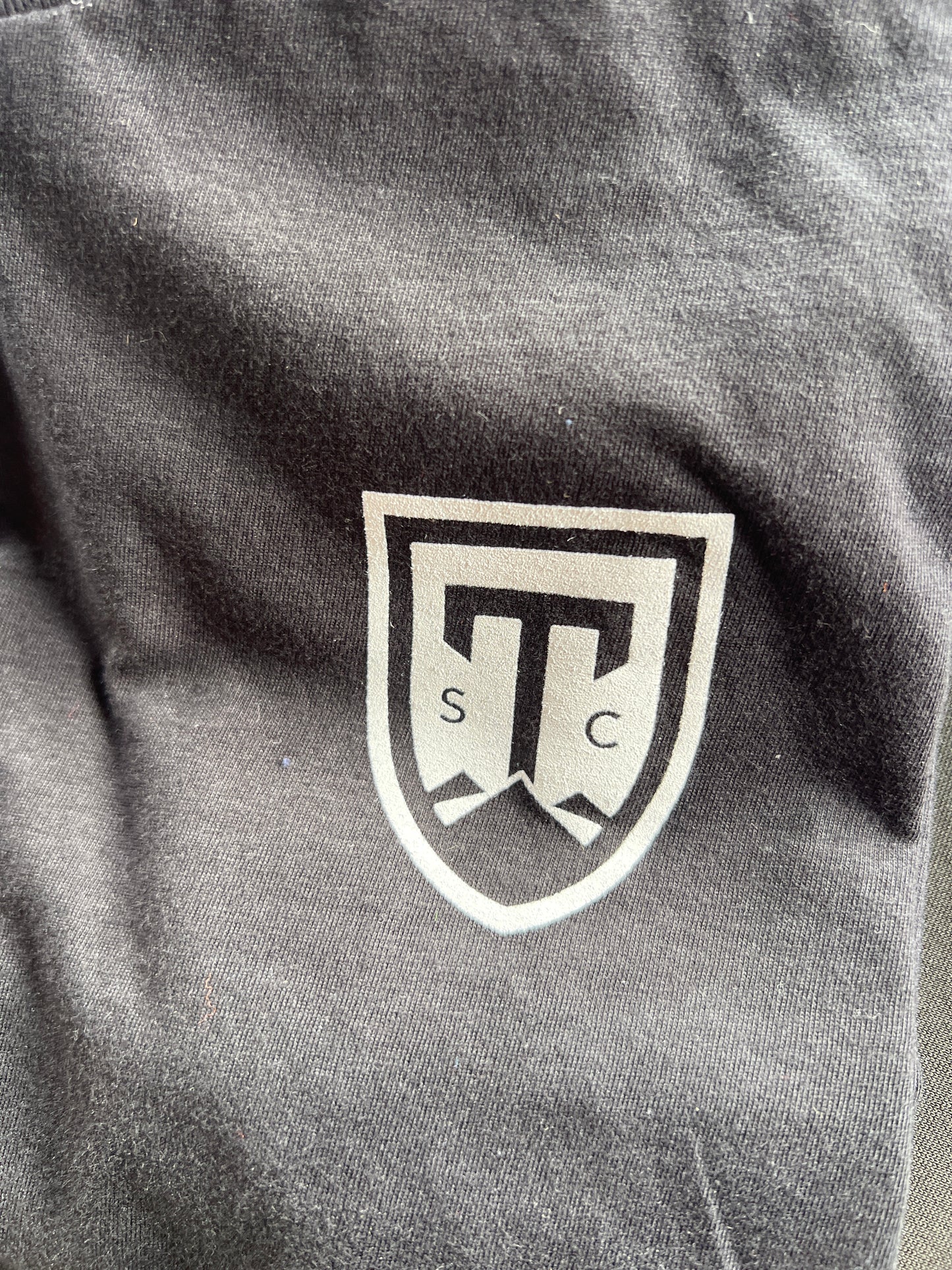 Greenville Triumph "Blackout Collection" | Soft Tee - Crest